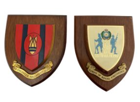 Two regimental shields. A 33 Engineer Regiment (EOD) shield and a Corps of Royal Engineers