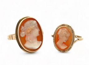 Two gold shell cameo rings both depicting a lady in profile. A ring with a head 21mm in length which