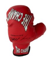 Ricky Hatton (British, b.1978), signed red ‘ THE CHAMP ‘ boxing glove, signed by boxing legend Ricky