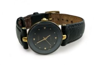 Rado Switzerland, a Rado Florence black faced ladies wristwatch, circular dial with leather strap