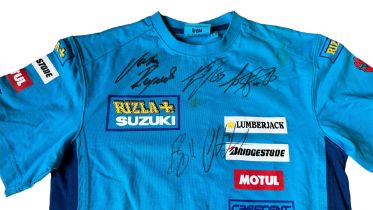 Signed Suzuki MotoGP team t-shirt. Signatures on shirt include, Loris Capirossi, Chris Vermeulen,
