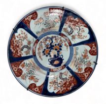 Large Japanese Imari pattern charger, internal floral decoration with six surrounding panels each