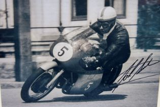 Framed signed John Surtees picture. John Surtees was a British Grand Prix motorcycle road racer