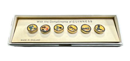 A boxed set of six vintage Guinness waist coat buttons, in box of issue.