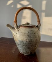 David Leach OBE (British, 1911-2005), for Lowerdown pottery, stoneware teapot with cane handle,