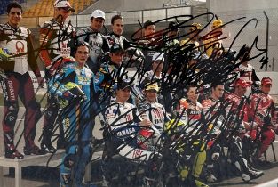 Framed signed 2007 MotoGP riders picture. Featuring the signatures of 16 riders from the 2007