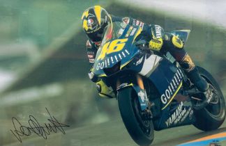 Framed signed Valentino Rossi Le Mans MotoGP picture. From the 2005 Le Mans MotoGP race. With COA