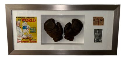 Randolph Turpin (British, 1928-1966), framed pair of leather boxing gloves worn by Randolph Turpin