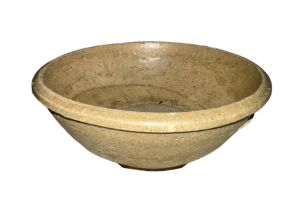 Chinese Ming Dynasty Celadon glaze bowl, covered in a deep olive-green glaze. Kwangtung Province,