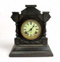 American Ansonia wooden mantel clock, white face with Roman numerals. Movement marked for Ansonia