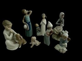 Seven pieces of Lladro porcelain figures. Includes figures of: girl carrying a hat, two children