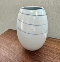 Joanna Constantinidis (British, 1927-2000), white and blue porcelain lustre ovoid vase, integral