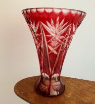 Ruby overlay cut crystal glass vase, waisted form. Height 21cm.