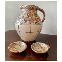 Charlotte Rhead (British, 1885-1947), for Bursley Ware jug and two small bowls. Jug height 22cm. (3)