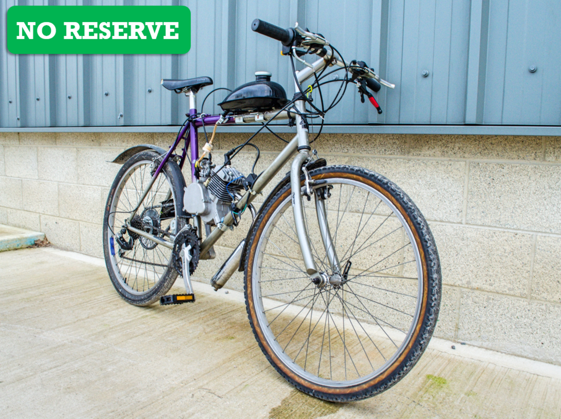 Adults mountain bike with petrol engine conversion