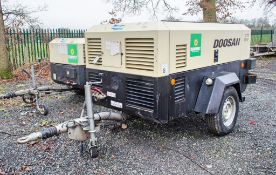 Doosan 7/73 10/53 diesel driven fast tow mobile air compressor Year: 2015 S/N: FY543515 Recorded