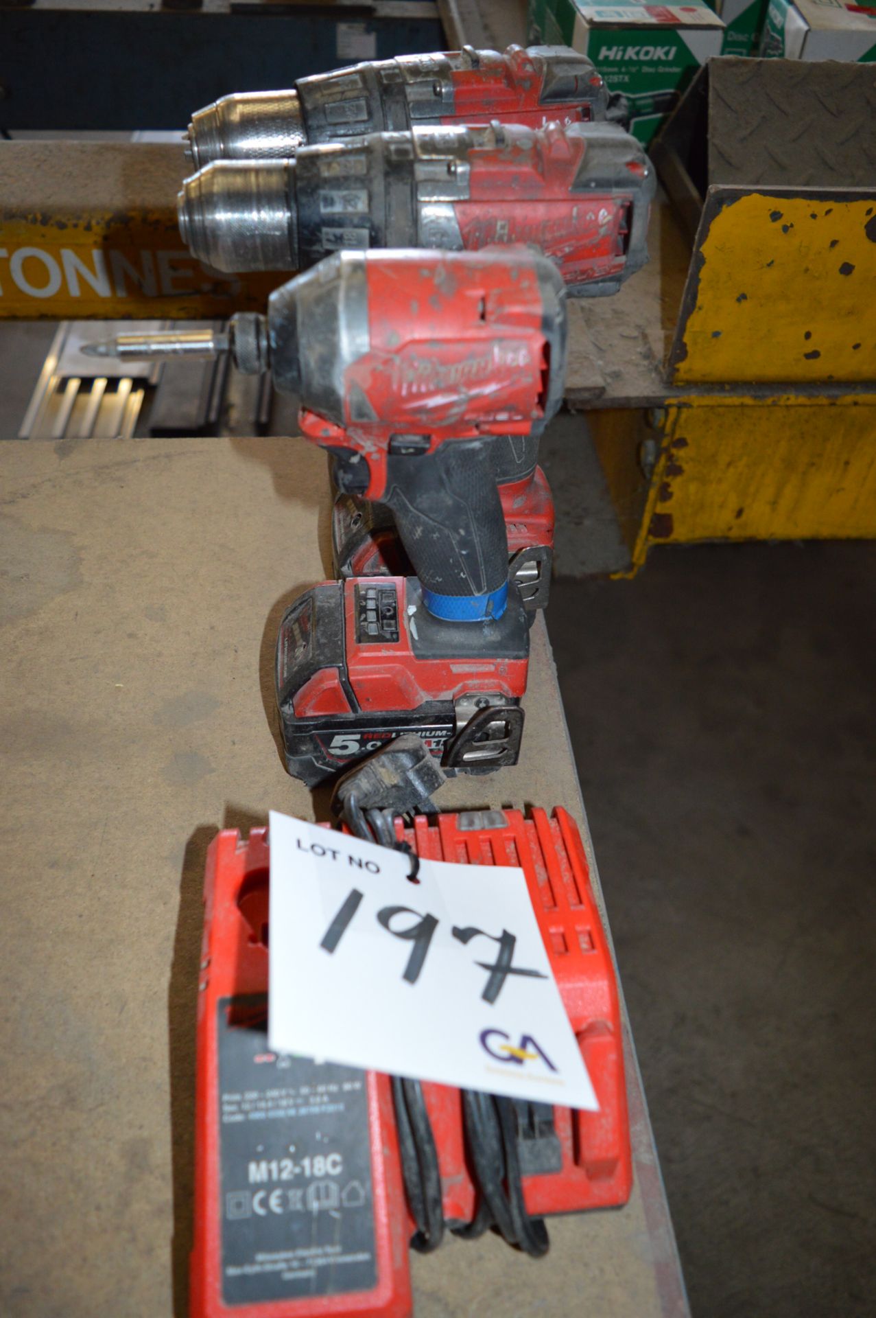 2 - Milwaukee drills, Milwaukee screwdriver c/w charger and 3 batteries ** No VAT on hammer price