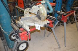 Makita 110v mitre saw Year: 2003 S/N: 169061E Model: LS1013 c/w lumberjack stand Model: MSS200 ** No