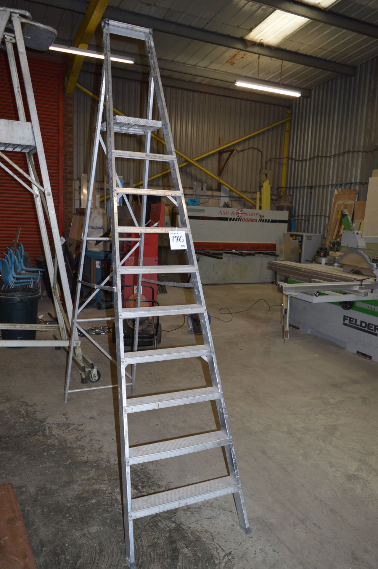 10 rise alloy step ladder ** No VAT on hammer price but VAT will be charged on the buyer's