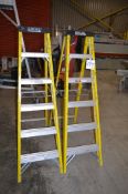 2 - 6 rise fibreglass step ladders ** No VAT on hammer price but VAT will be charged on the buyer'