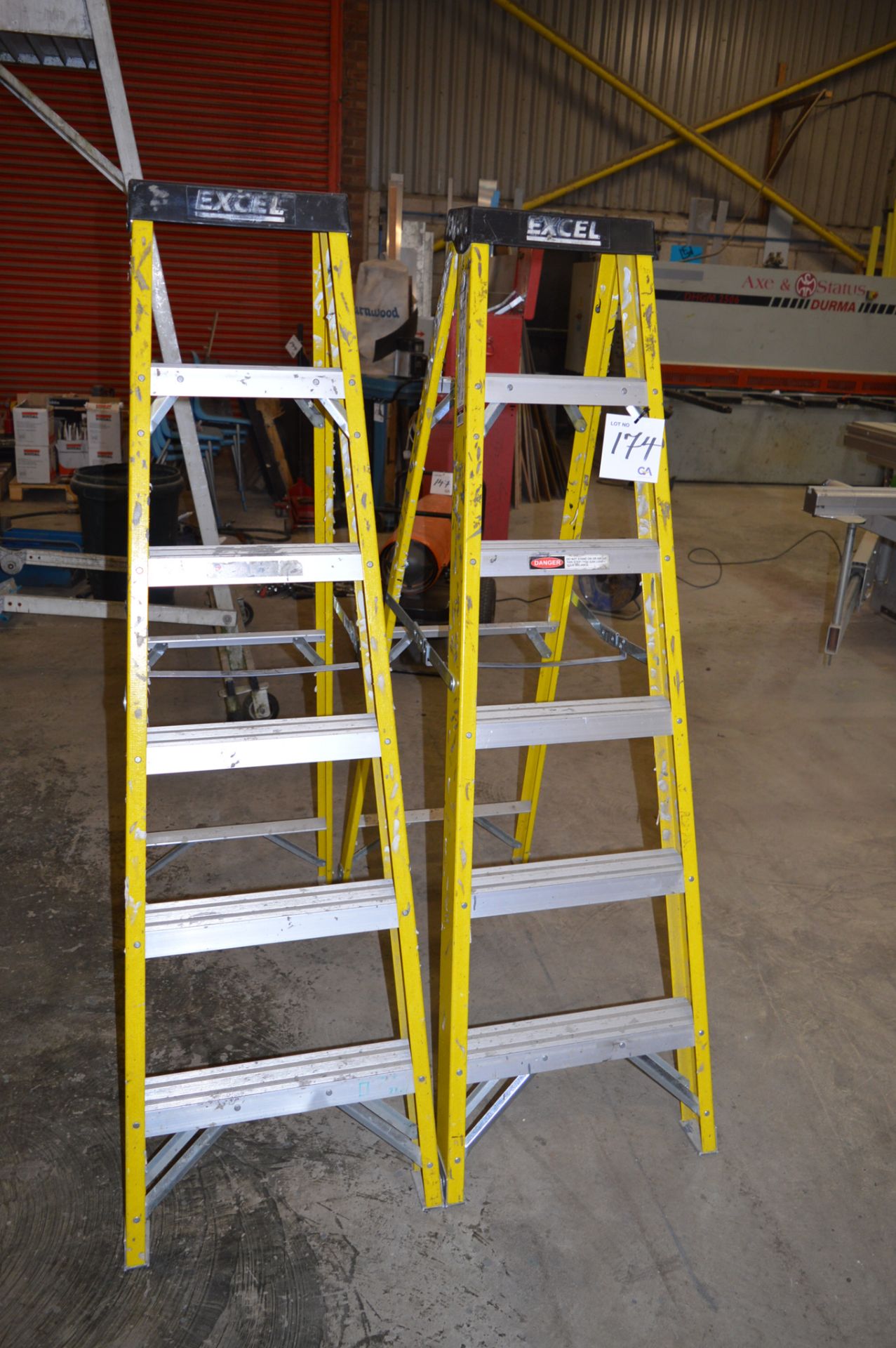 2 - 6 rise fibreglass step ladders ** No VAT on hammer price but VAT will be charged on the buyer'