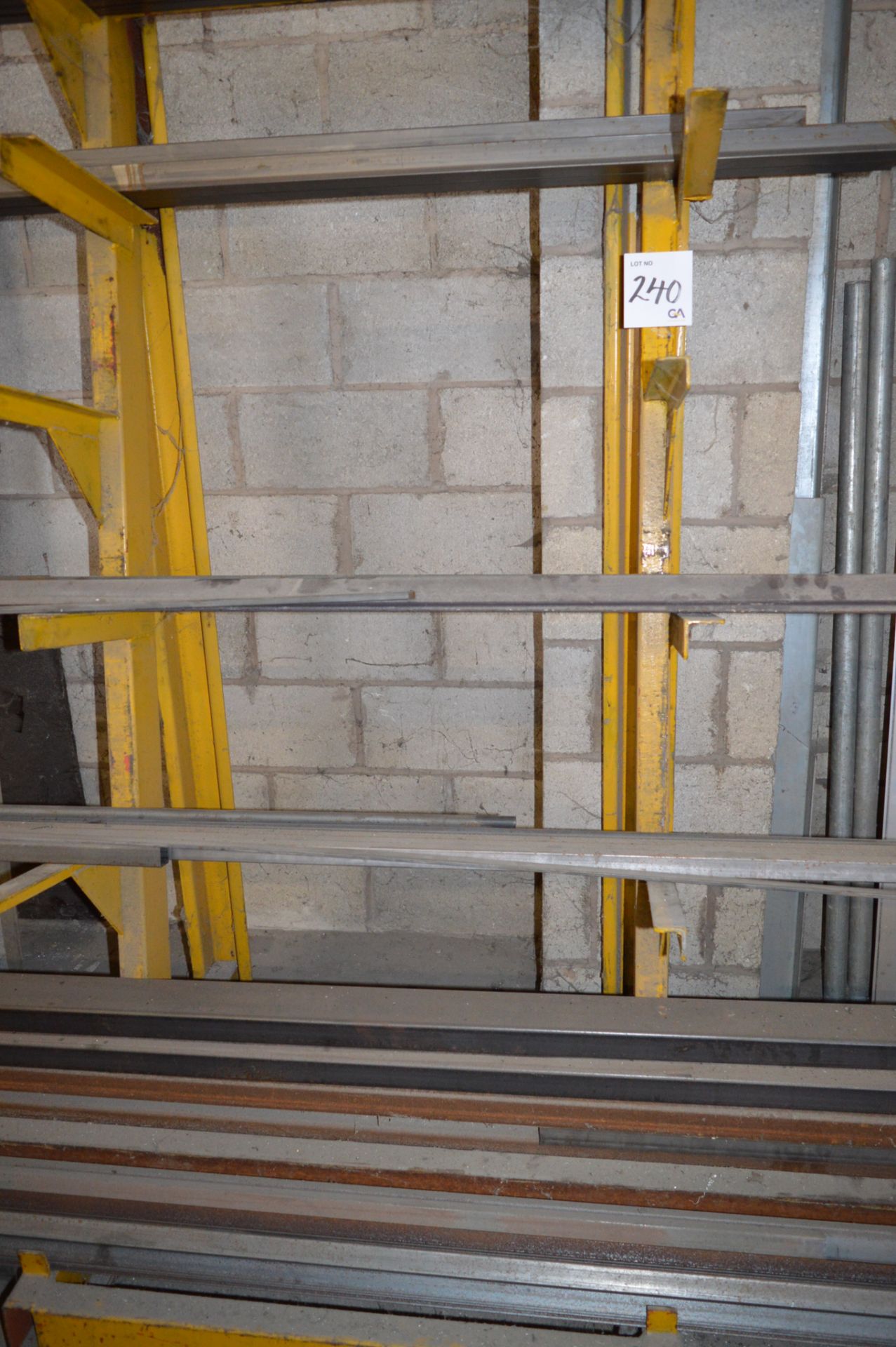 2 - 6 tier mobile steel stock racks and contents of steel stock Including angle, box etc. ** No - Image 2 of 4