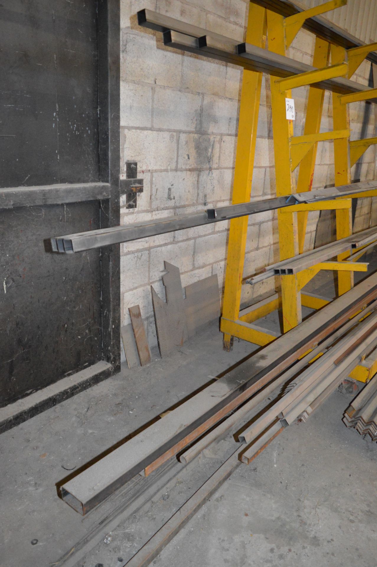 2 - 6 tier mobile steel stock racks and contents of steel stock Including angle, box etc. ** No - Image 3 of 4