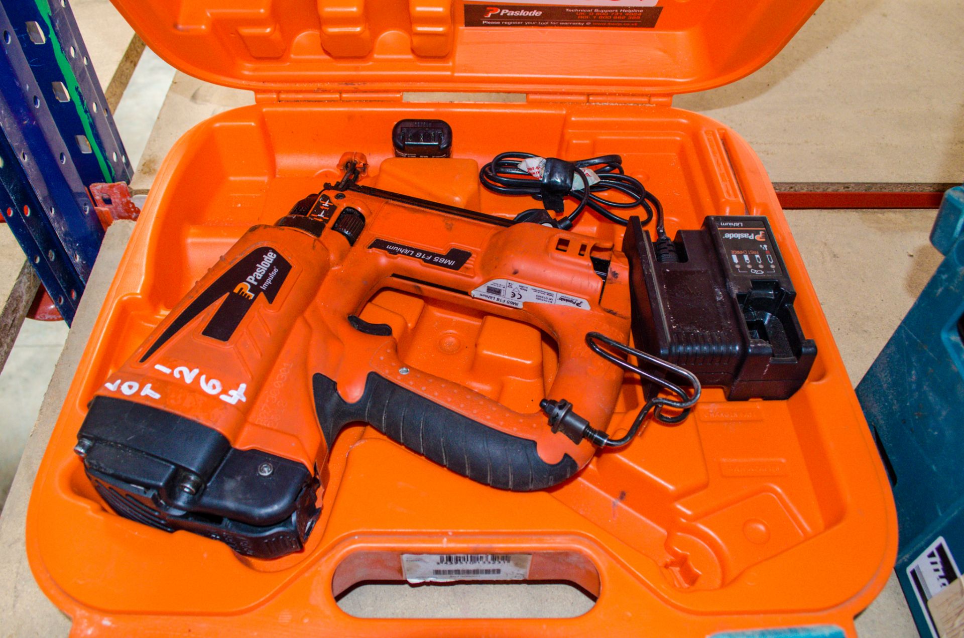 Paslode IM65 F16 cordless nail gun c/w battery, charger and carry case A986390