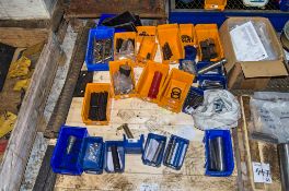 Pallet of pipe lifter grips, breaker pins, auger pins etc