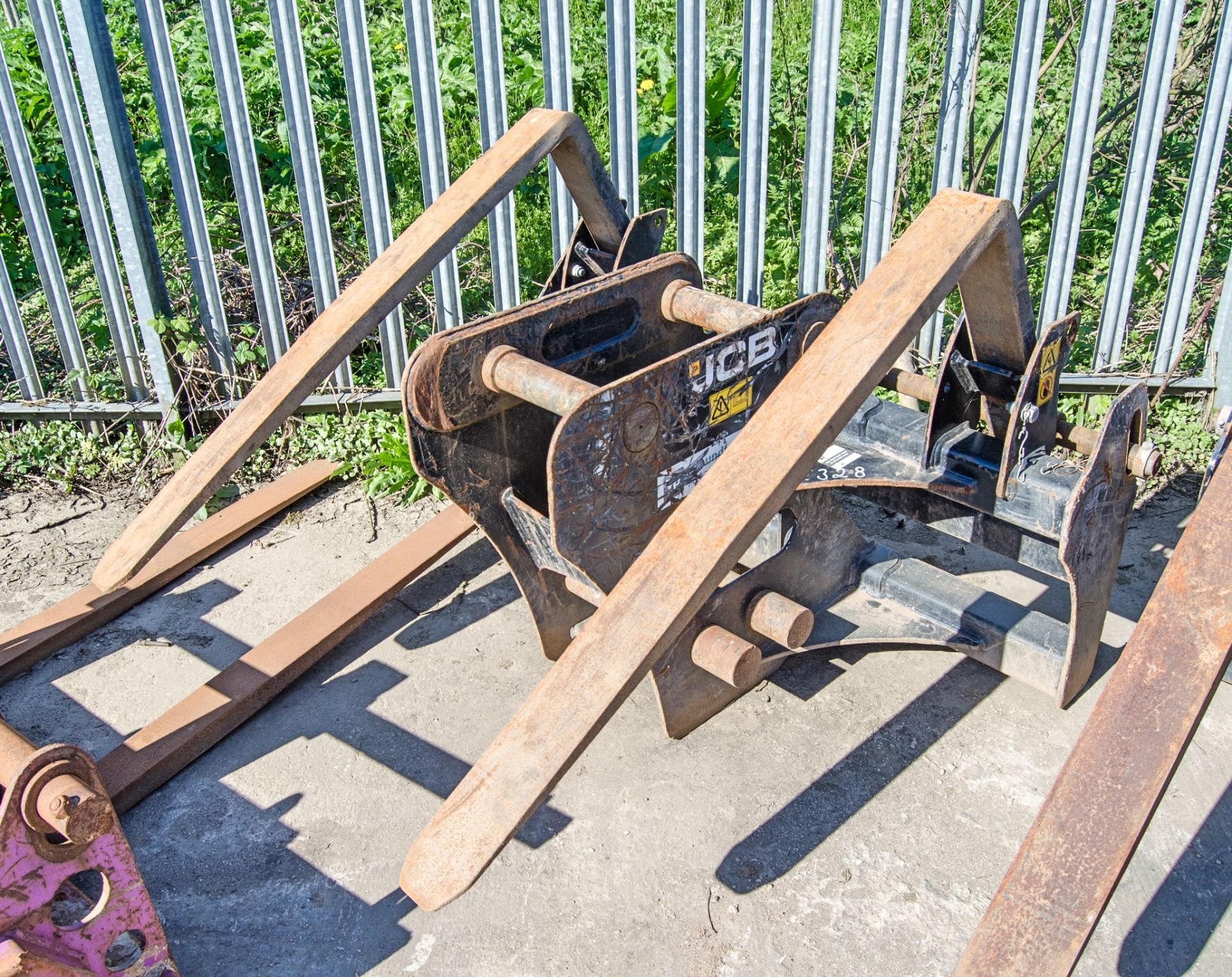 JCB fork carriage to suit 10-24 tonne excavator c/w headstock Pin diameter: 65mm Pin centres: