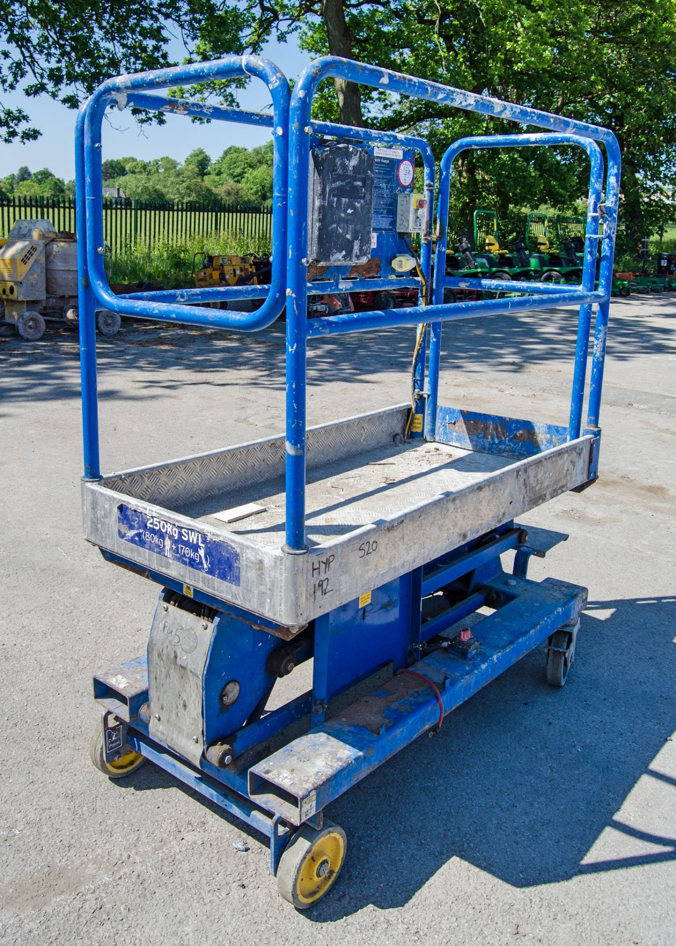 Power Tower battery electric push around scissor lift access platform Year: 2011 S/N: 16073111A