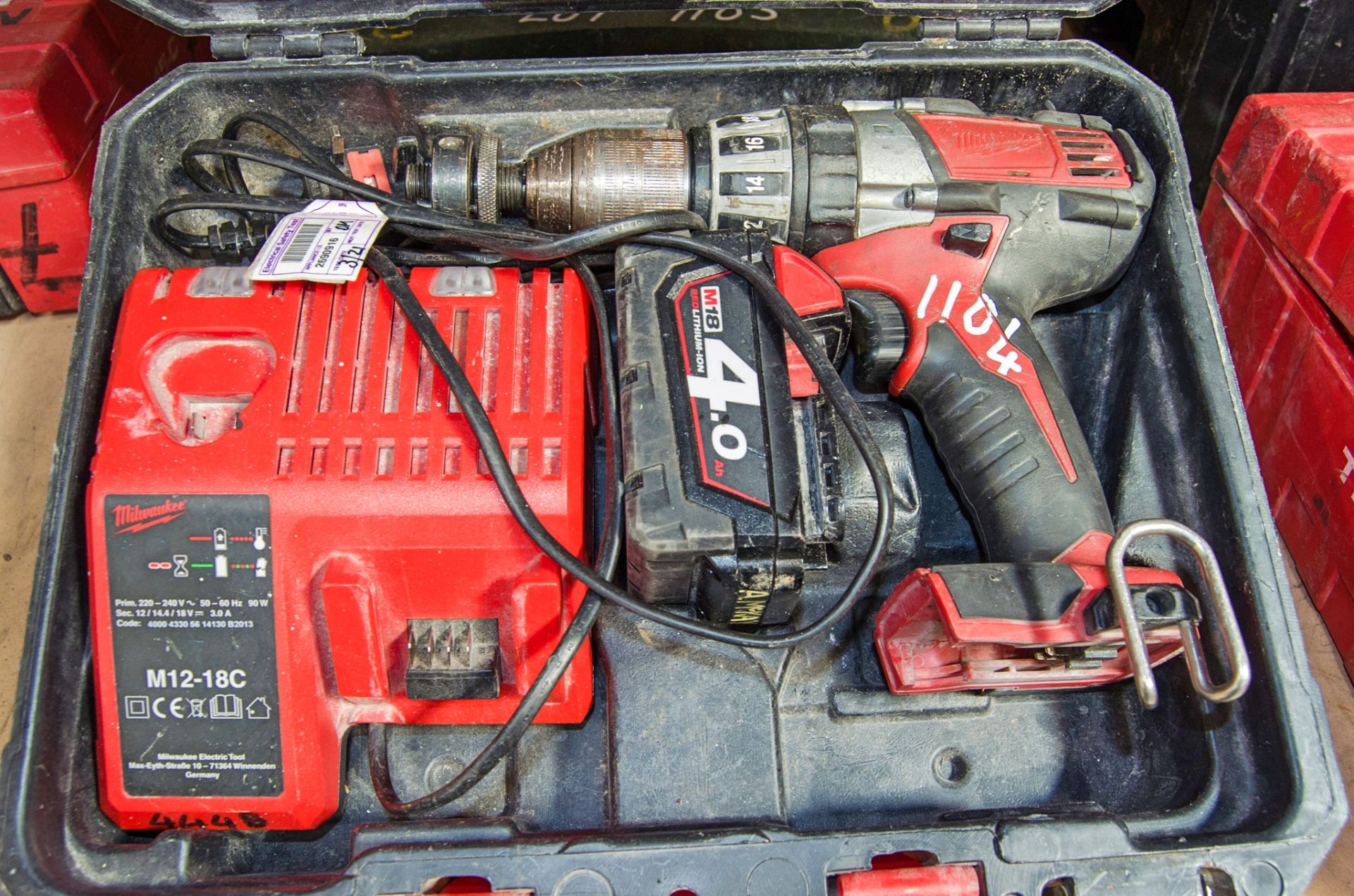 Milwaukee C18PD 18v cordless power drill c/w battery charger and carry case AM4448