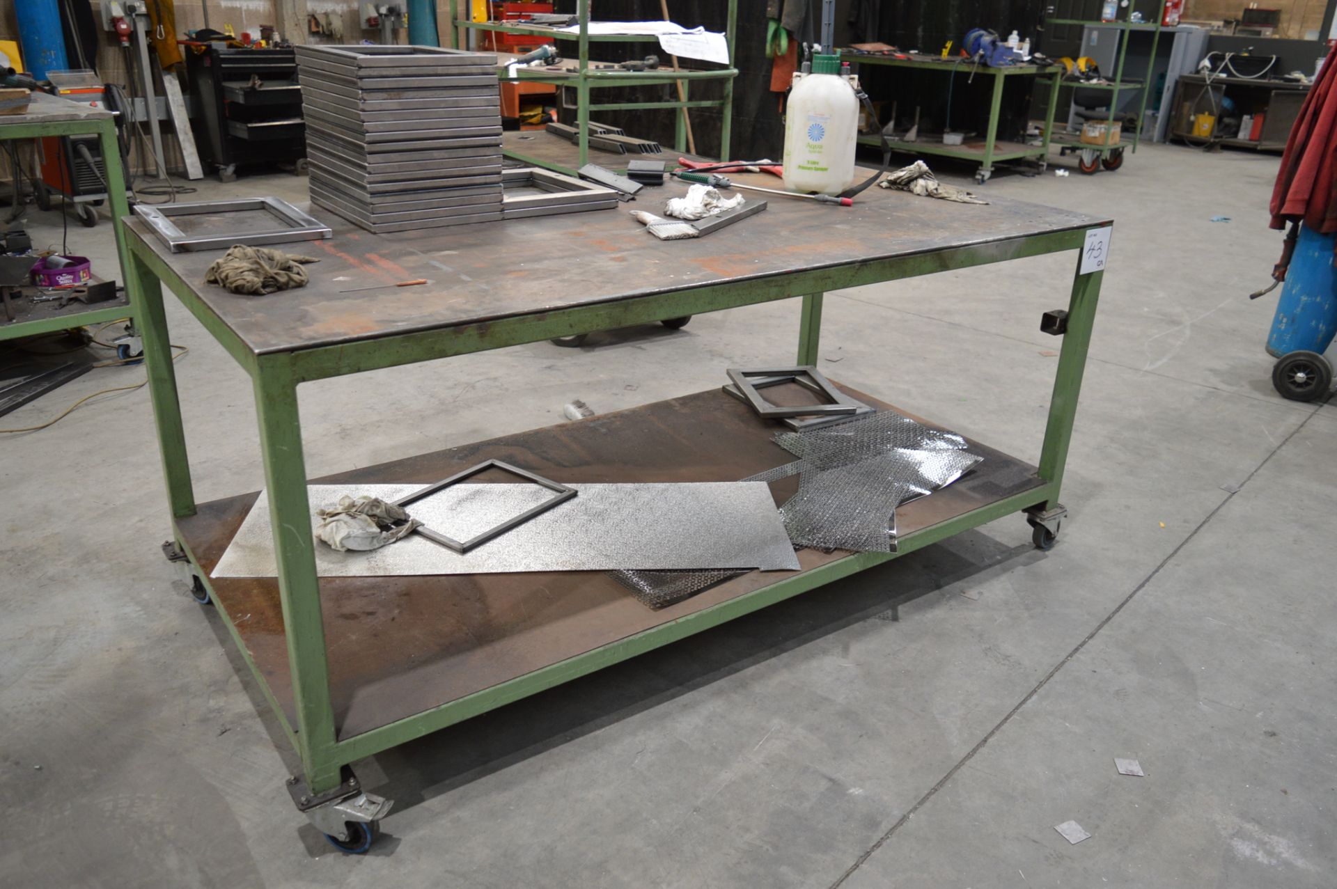 Fabricated steel mobile work bench Approx. 2000mm x 1000mm x 910mm high ** Not including