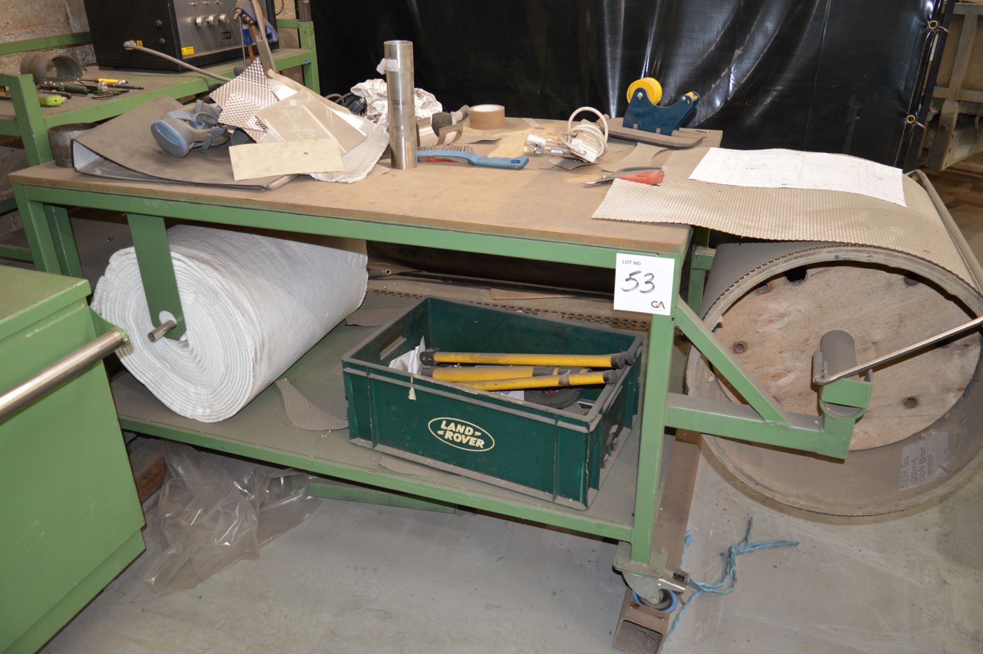 Fabricated steel mobile work bench Approx. 1500mm x 900mm x 835mm high c/w unreeling frame ** Not