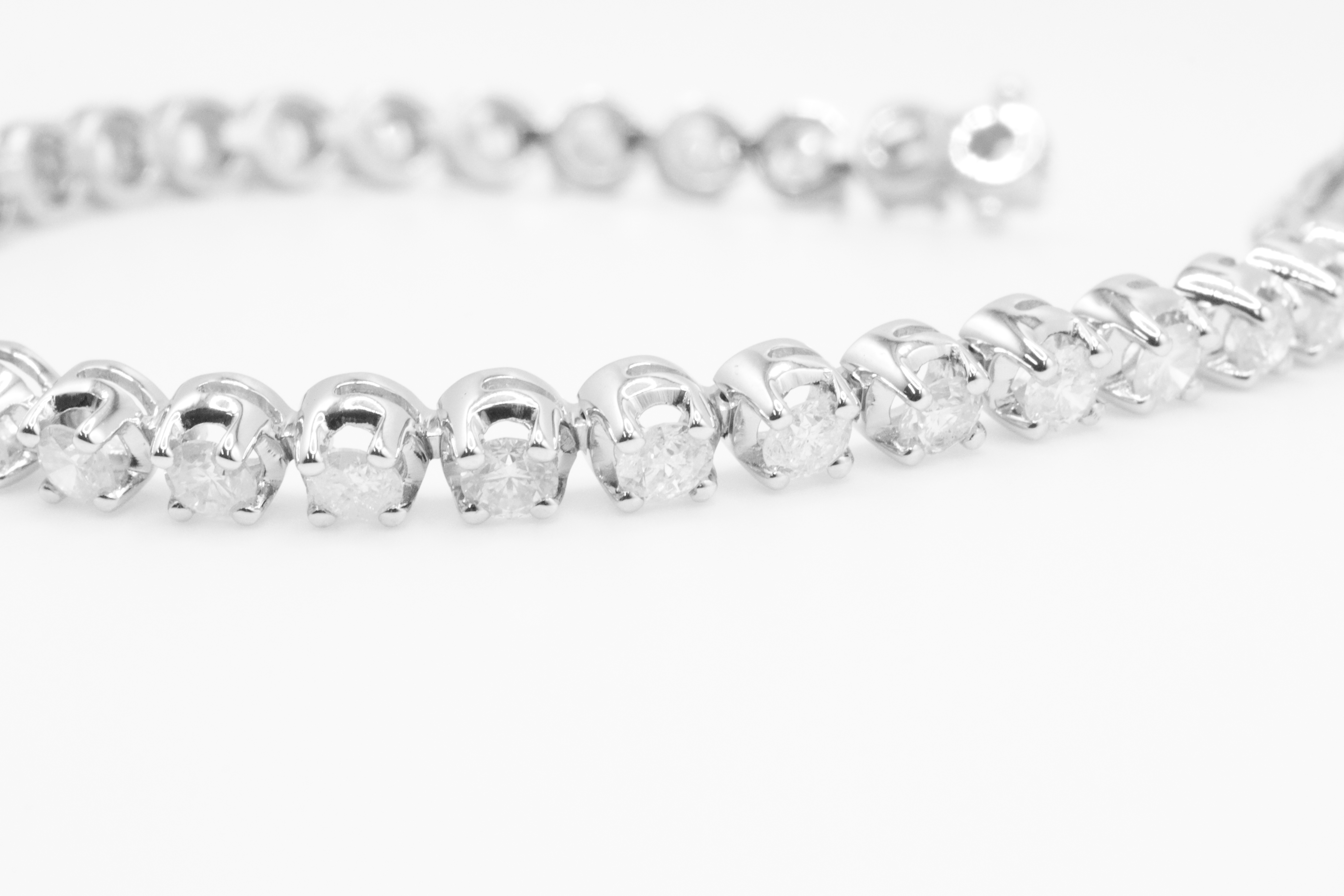 7.0 Carat 18ct White Gold Tennis Bracelet set with Round Brilliant Cut Natural Diamonds - Image 8 of 16