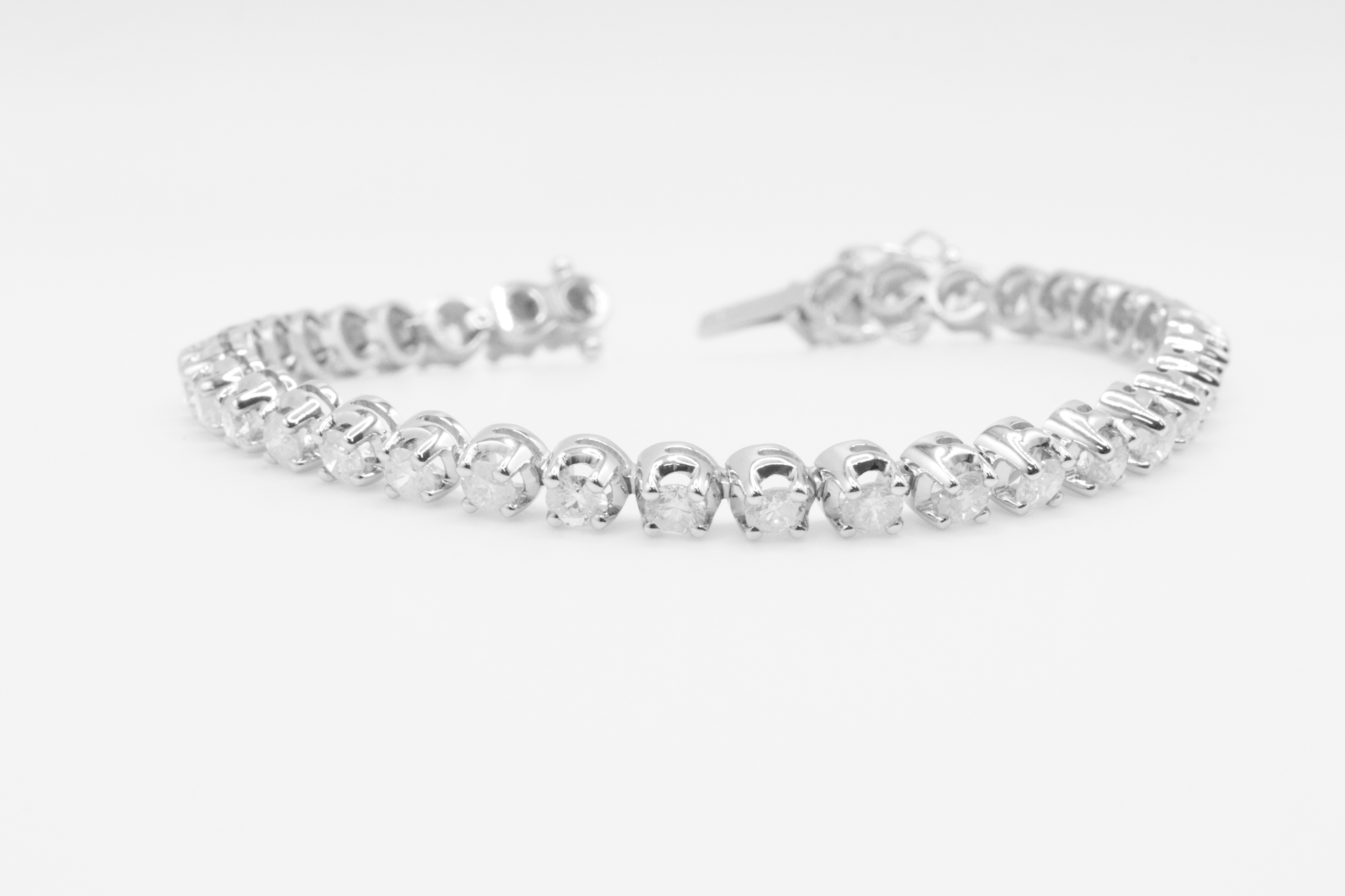 7.0 Carat 18ct White Gold Tennis Bracelet set with Round Brilliant Cut Natural Diamonds - Image 2 of 16