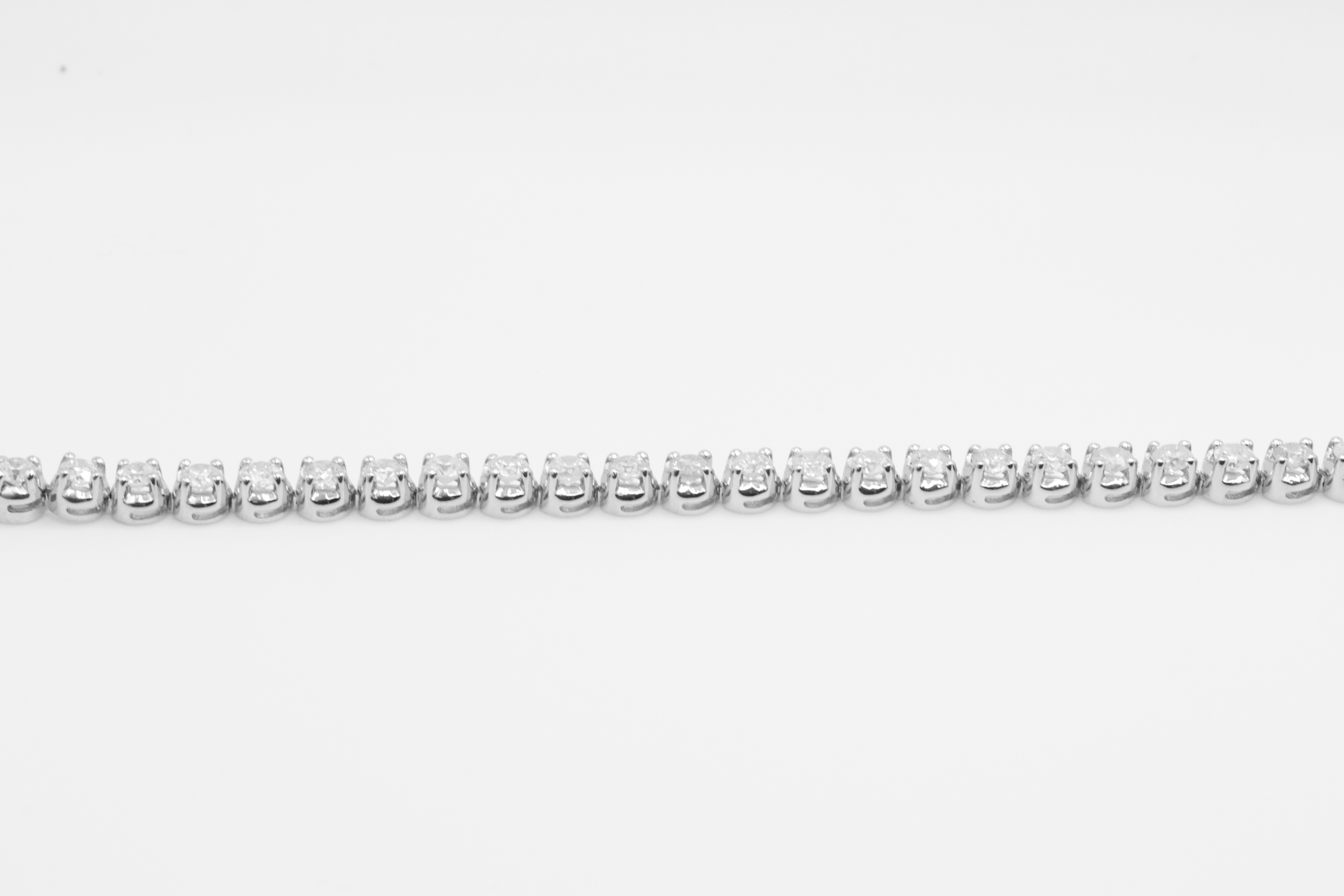 7.0 Carat 18ct White Gold Tennis Bracelet set with Round Brilliant Cut Natural Diamonds - Image 9 of 16