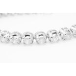 7.0 Carat 18ct White Gold Tennis Bracelet set with Round Brilliant Cut Natural Diamonds