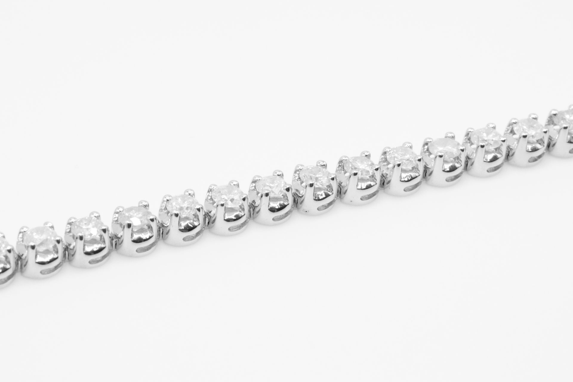 7.0 Carat 18ct White Gold Tennis Bracelet set with Round Brilliant Cut Natural Diamonds - Image 9 of 16