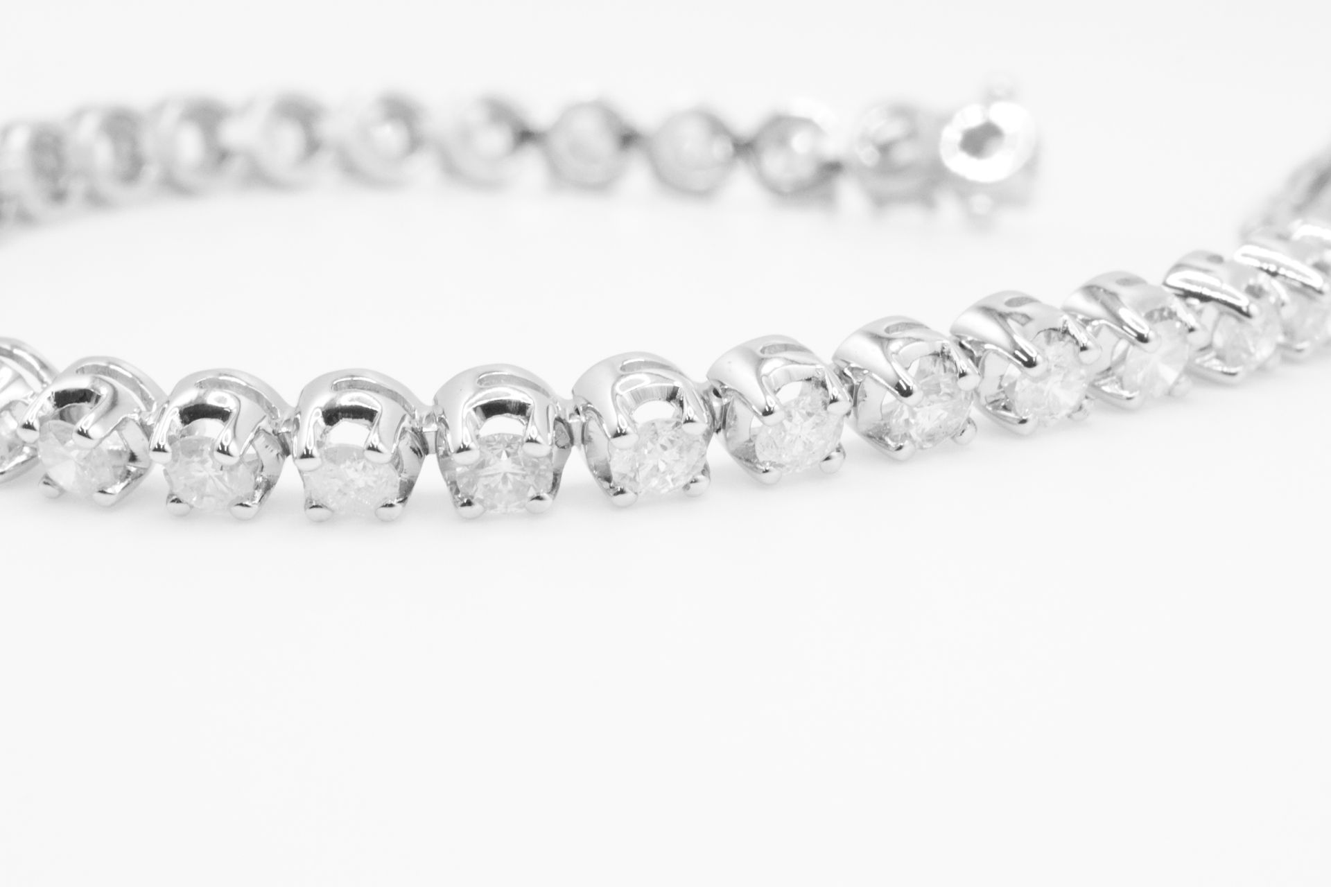 7.0 Carat 18ct White Gold Tennis Bracelet set with Round Brilliant Cut Natural Diamonds - Image 13 of 16