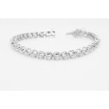 7.0 Carat 18ct White Gold Tennis Bracelet set with Round Brilliant Cut Natural Diamonds