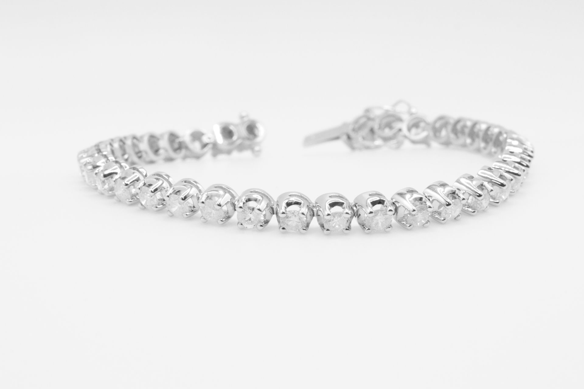 7.0 Carat 18ct White Gold Tennis Bracelet set with Round Brilliant Cut Natural Diamonds - Image 9 of 16