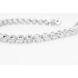 7.0 Carat 18ct White Gold Tennis Bracelet set with Round Brilliant Cut Natural Diamonds