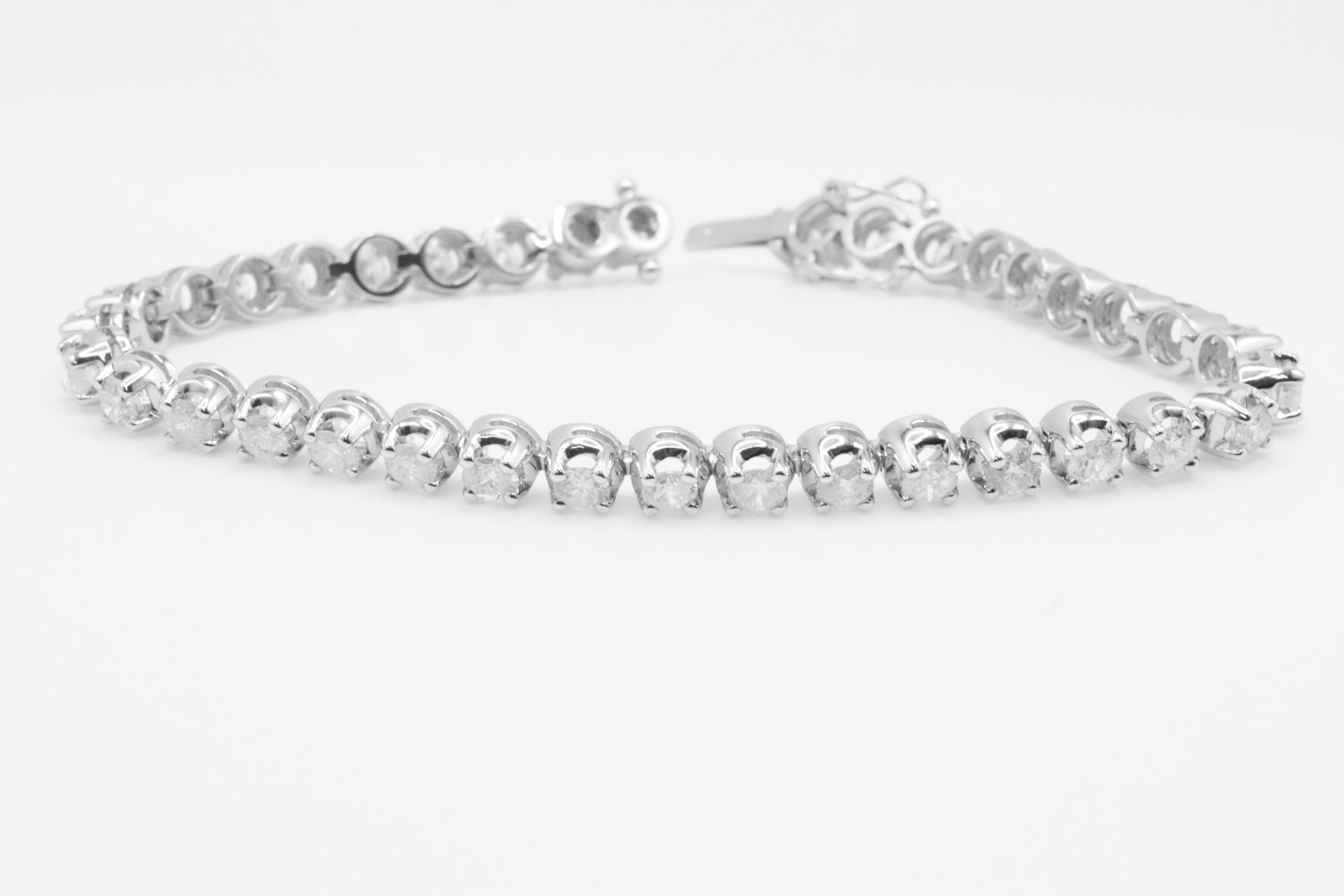 7.0 Carat 18ct White Gold Tennis Bracelet set with Round Brilliant Cut Natural Diamonds - Image 11 of 16