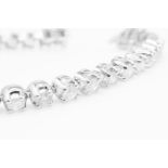 7.0 Carat 18ct White Gold Tennis Bracelet set with Round Brilliant Cut Natural Diamonds