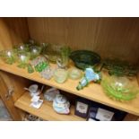 Shelf of Collected Green and Uranium Glass Decorative Bowls and Homewares