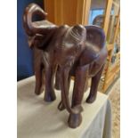 Pair of North African Carved Hardwood Elephants - smaller H 35.5cm, taller H 41cm