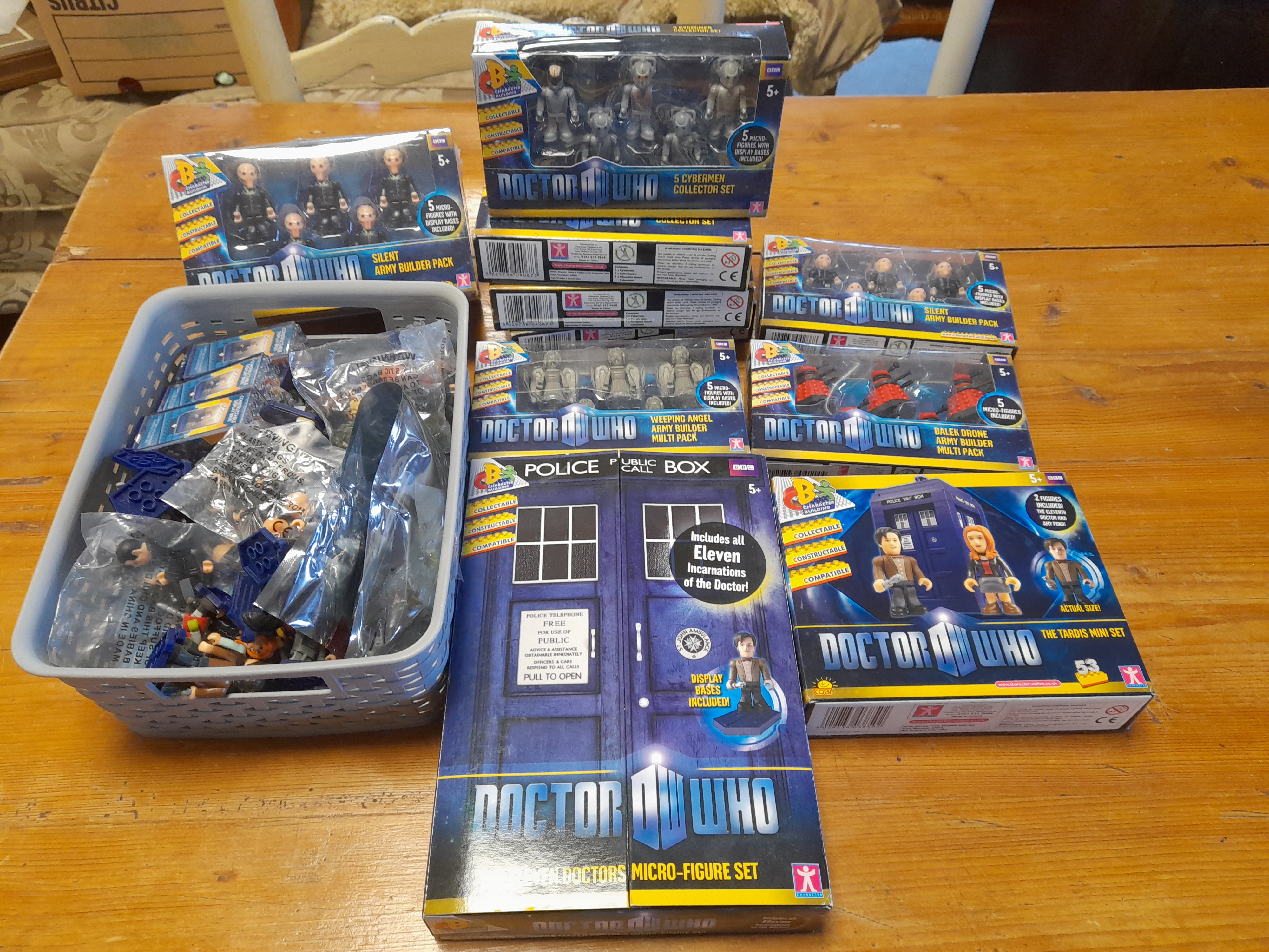 Group of Boxed and Unboxed Character Building Doctor Who Micro-Figures including The Eleven Doctors