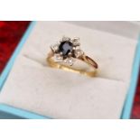 18ct Gold, Diamond and Sapphire Star Ring, size N and 3.19g