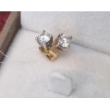 Pair of 18ct Gold, Diamond and Platinum earrings, 1.07g